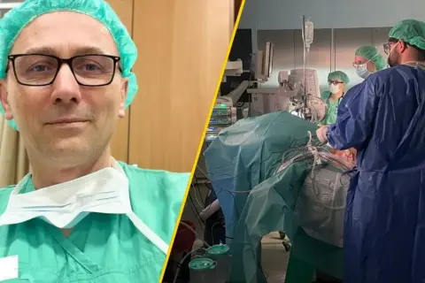 Chirurg w okularach i czepku przygotowuje się do operacji, która może być przełomem w leczeniu raka trzustki. Zespół medyczny w sali operacyjnej.